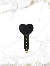 Black box with sensual leather accessories