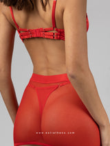 Red satin lingerie set with fringe and garters