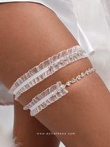 Silver bridal garters with white rhinestones