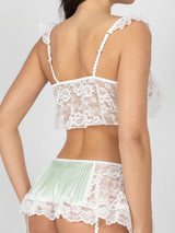 Green lingerie set with lace and pleated fabric